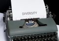 green and white typewriter on white table